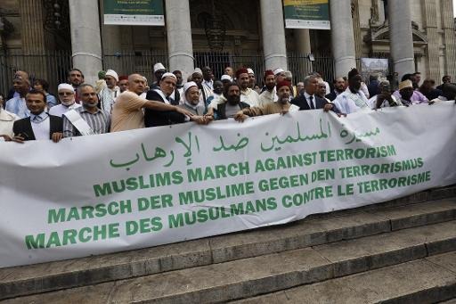 The Muslims March Against Terrorism stops in front of the Bourse in Brussels
