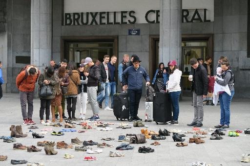 Some 400 shoes deposited at Brussels Central Station to symbolize Kurds killed in Turkish army bombing