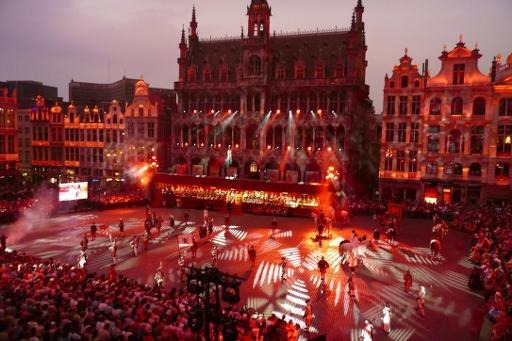 The Grand-Place of Brussels illuminates in Belgium's colours