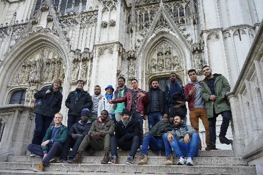 Around 20 immigrants visit the centre of Brussels as tourists