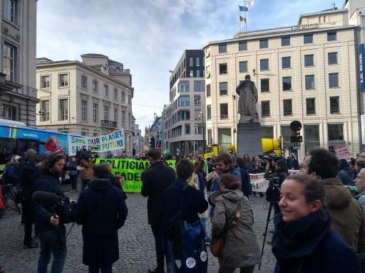 Protesters outside Parliament call for more ambitious climate policy