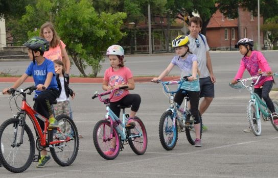 Smart bicycle light to guide school children safely through traffic