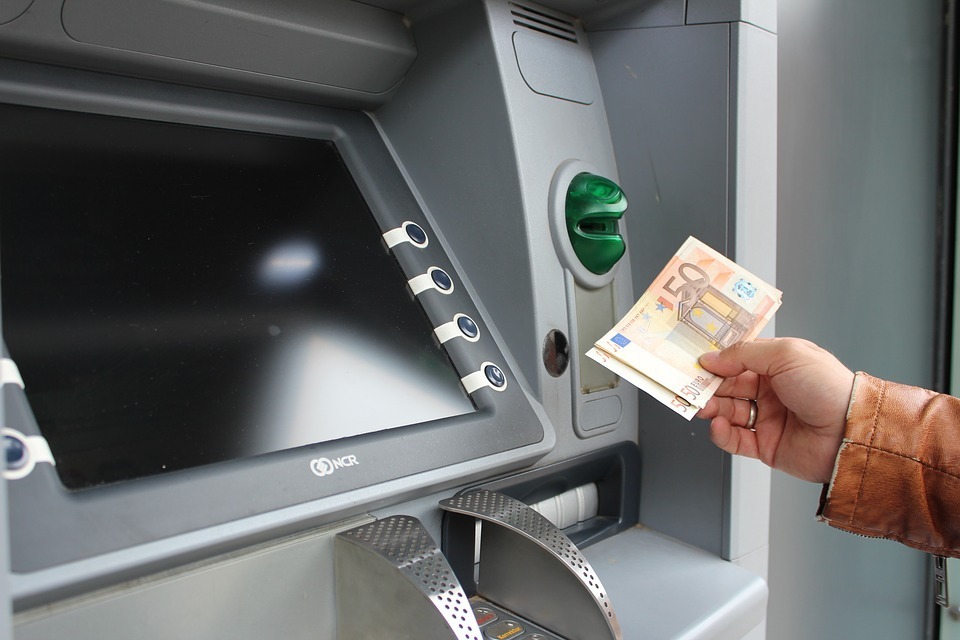 KBC swaps banks for ATMs, sparks employment fears