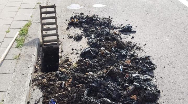 'Sewers are not bins': dozens of dog poop bags pulled from clogged gutter