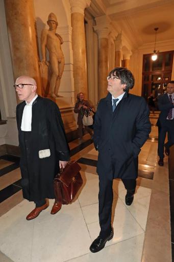 Former Catalan president Carles Puigdemont arrives at Brussels courthouse
