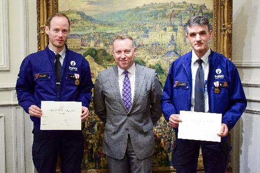 Police given award for saving drowning person from the icy Sambre river