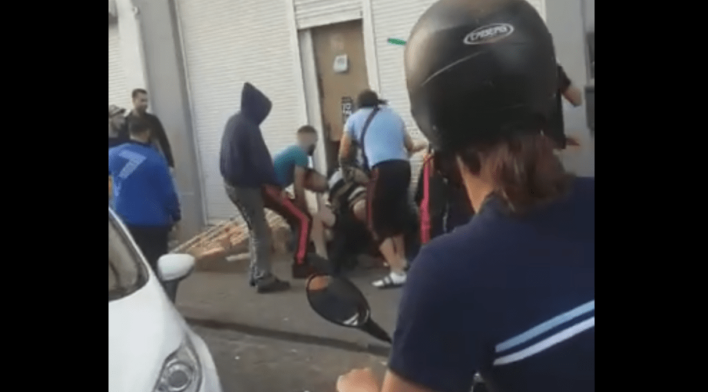 Two arrested after violence against police caught on video