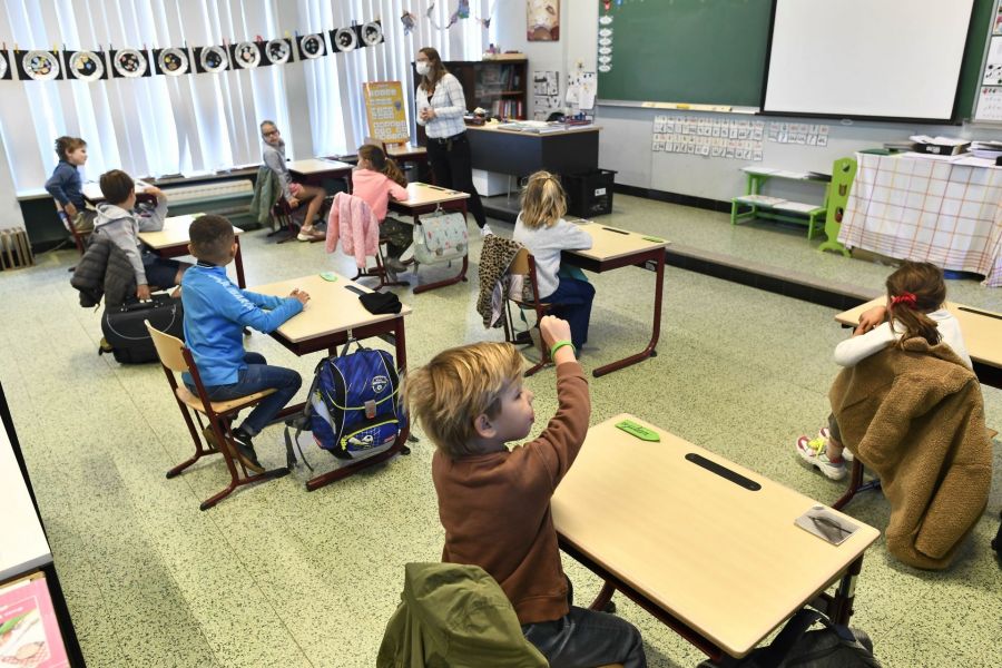 Children could sit closer together in class from June