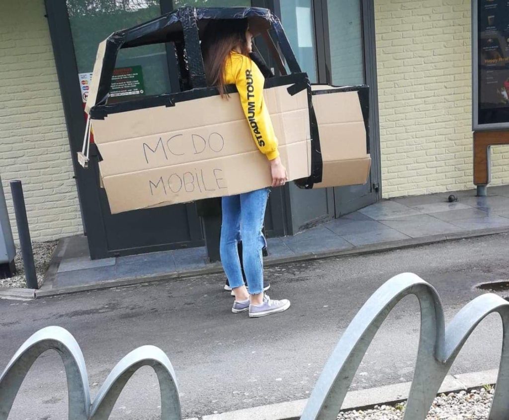 Belgian mom makes cardboard car to get McDonald's drive-thru meal
