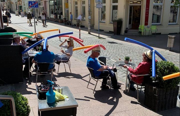 German cafe uses pool noodles to enforce social distance