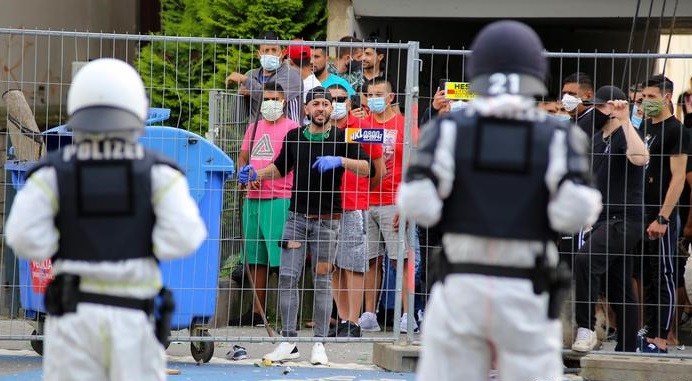 Quarantined housing block residents in Germany attack police