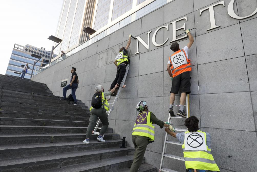 Extinction Rebellion takes out the 'finance' from Brussels' Finance Tower