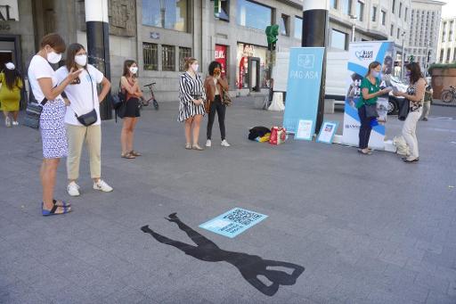 Shadows of modern slaves laid out in Brussels for human trafficking awareness