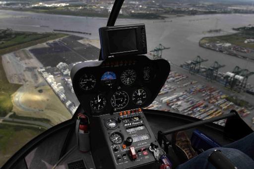 Helicopter hijacking suspects remain at large