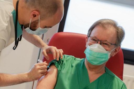 First caregiver in Brussels hospital receives coronavirus vaccine