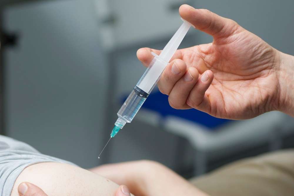 Belgium says UK rushed vaccines, UK says otherwise