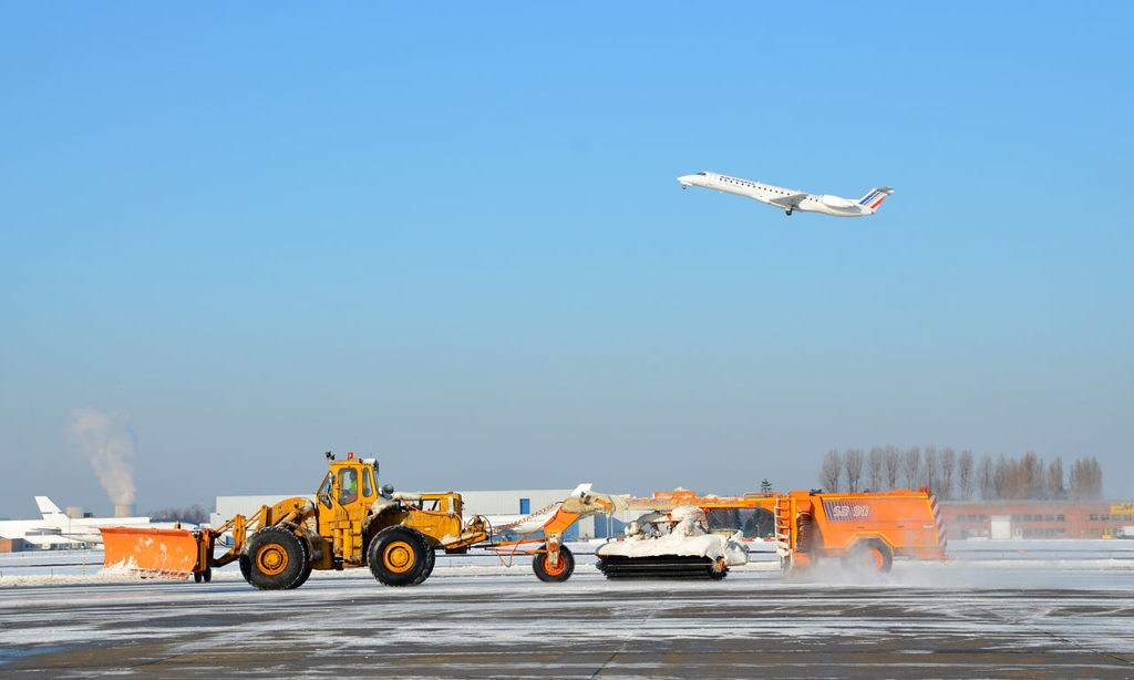 Farmers keep airport runways clear of ice and snow
