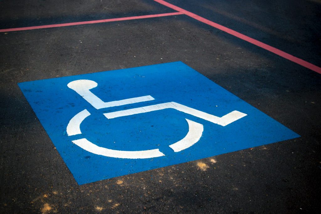 Police crackdown on people using handicapped parking cards of dead people