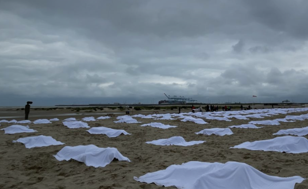 Hundreds of 'graves' erected on Belgian beach to denounce EU migration policy