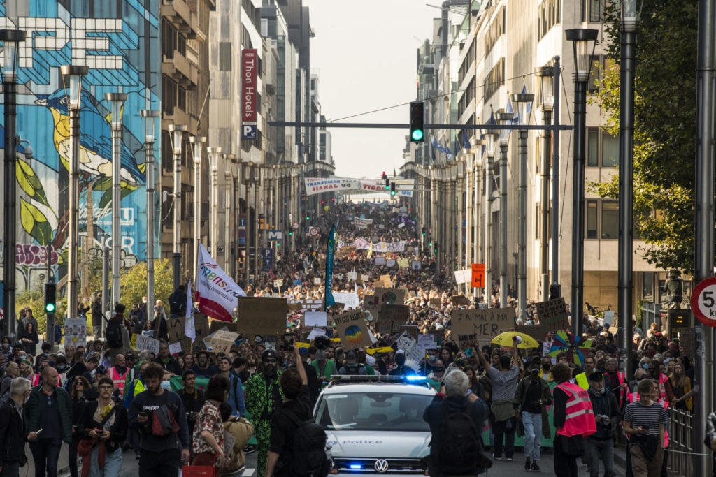 'More determined than ever': Tens of thousands march for climate justice