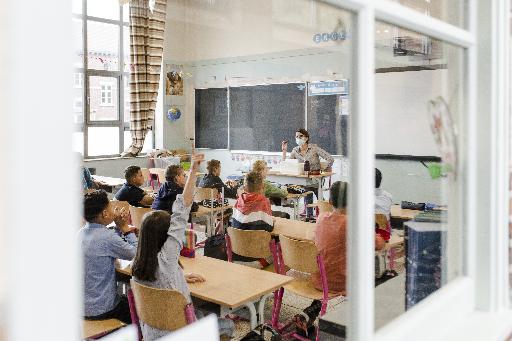 WHO urges countries to keep schools open