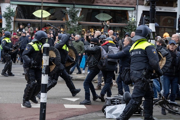 Police disperse demonstration against health measures in Amsterdam