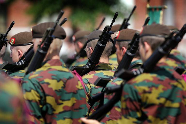 60% of Belgians would not take up arms to protect their country