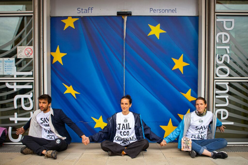 Climate activists superglue themselves to EU Commission entrance