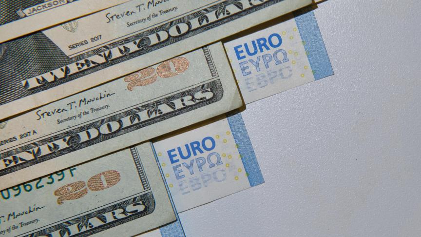 Euro reaches parity with dollar for the first time since 2002