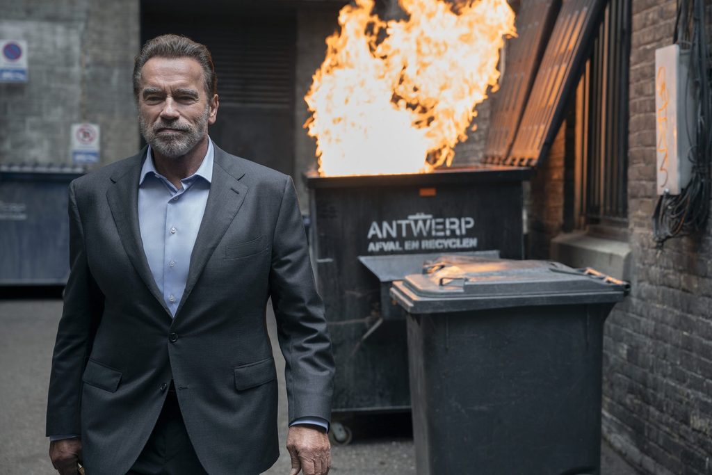 Arnold Schwarzenegger races through Antwerp and drinks local beer in Netflix show 'FUBAR'