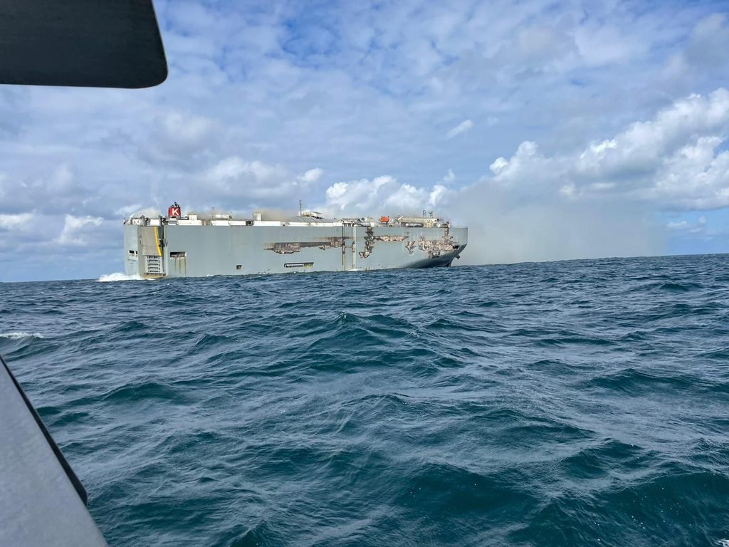 Burning cargo ship off Dutch coast will likely be towed to temporary anchorage this weekend