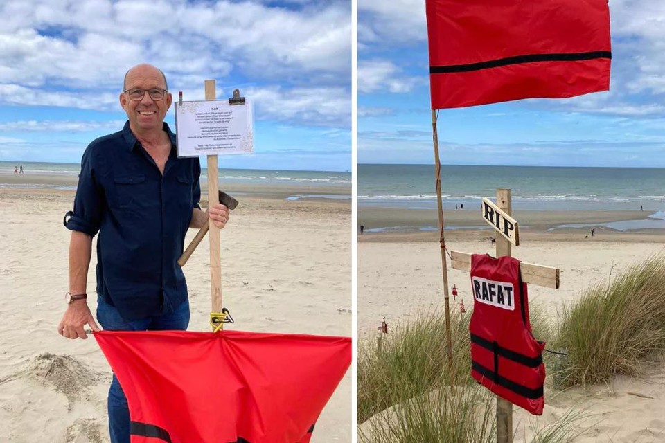 Trail of crosses with refugees' life jackets placed on Belgian beach