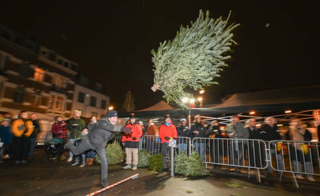 Hundreds participate in Christmas tree-hurling contest in Brussels