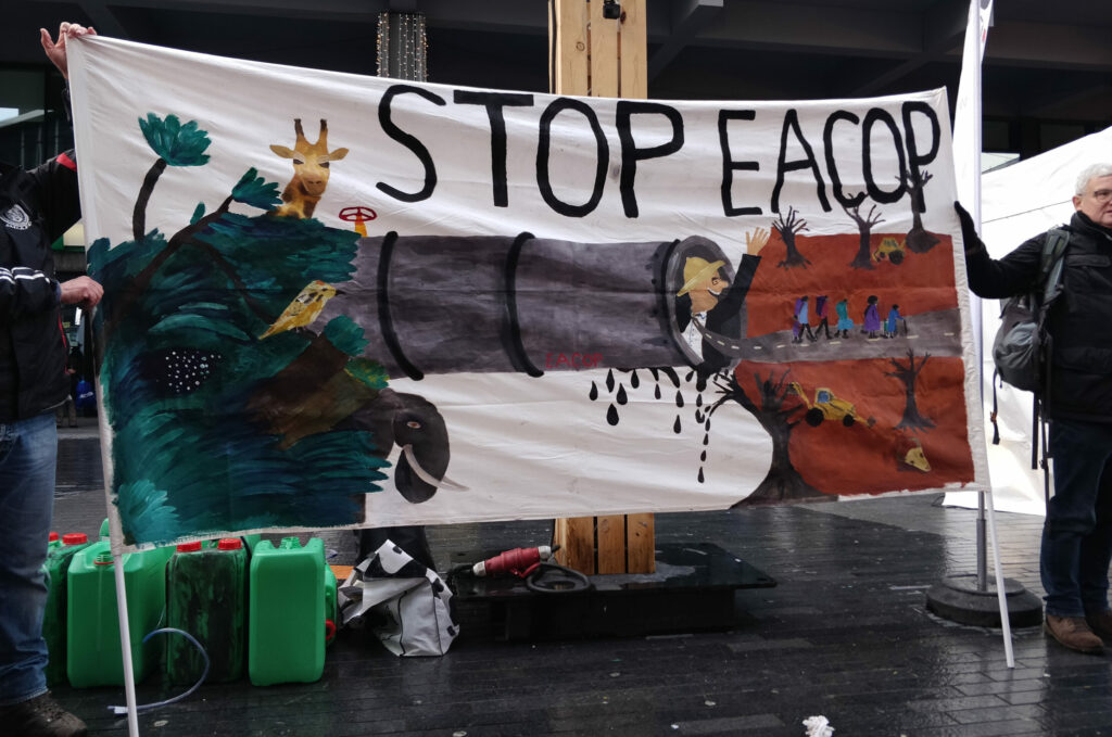 Climate activists block Brussels insurance company office in protest of East African pipeline
