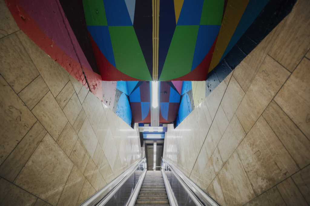 Bright frescoes transform dull Rogier metro station into lively art gallery