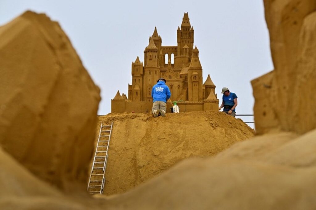 Sand sculpture festival on Belgian beach takes visitors around the world