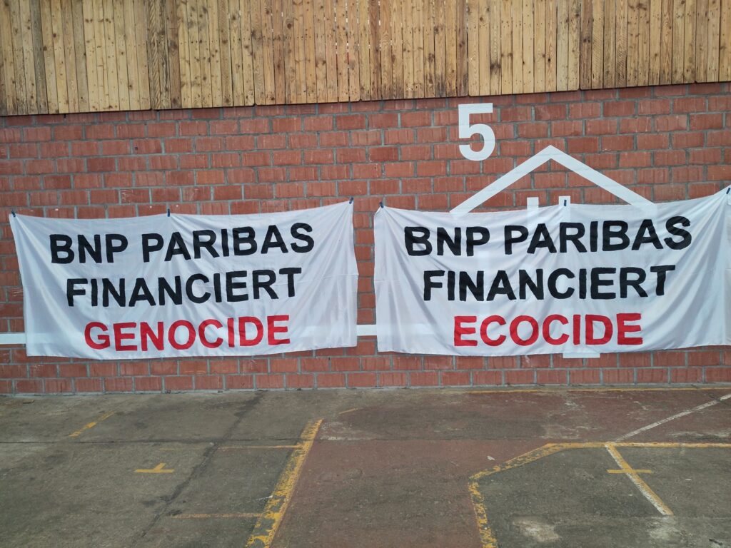 Activists protest against BNP Paribas and 'ecocidal' investments in Leuven