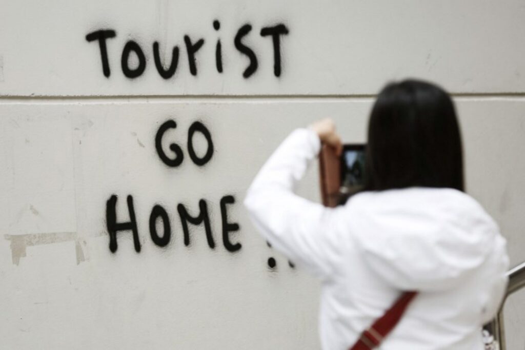 Record holiday bookings via online platforms fuel concerns of overtourism