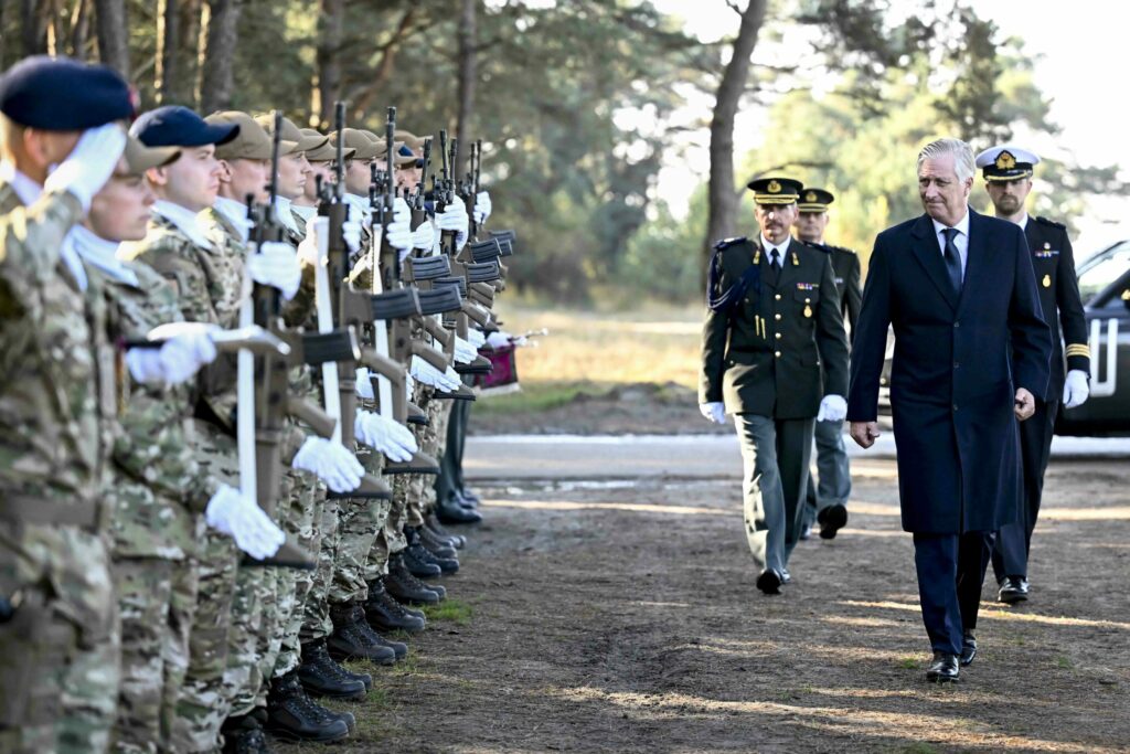 King Philippe meets with young people taking part in army's employment scheme