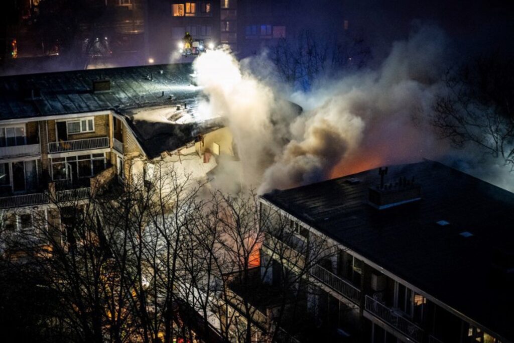 Explosion destroys apartment building in The Hague: Firefighters search through rubble