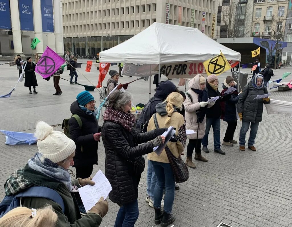 Extinction Rebellion and Attac take action against fast fashion in Brussels