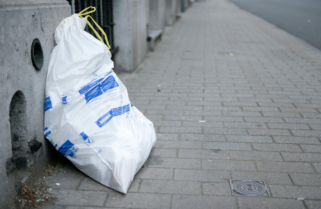 Rubbish bags litter the streets as refuse collectors go on strike in Brussels