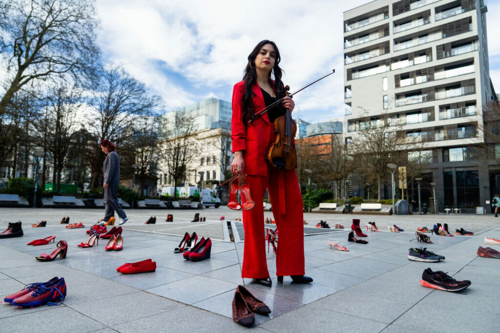 European Parliament urged to tackle femicide in red shoe protest in Brussels