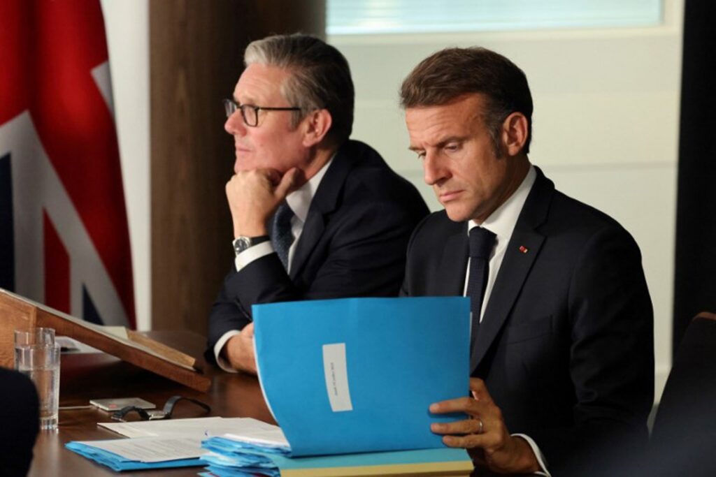 UK, France agree to try out migrant swap