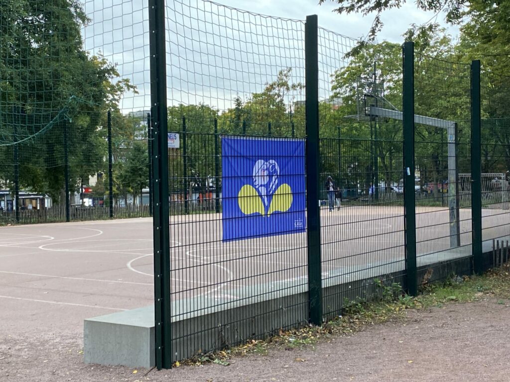Why are these flags appearing on the streets of Brussels?