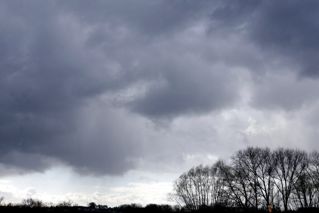 Cloudy skies and falling temperatures continue today
