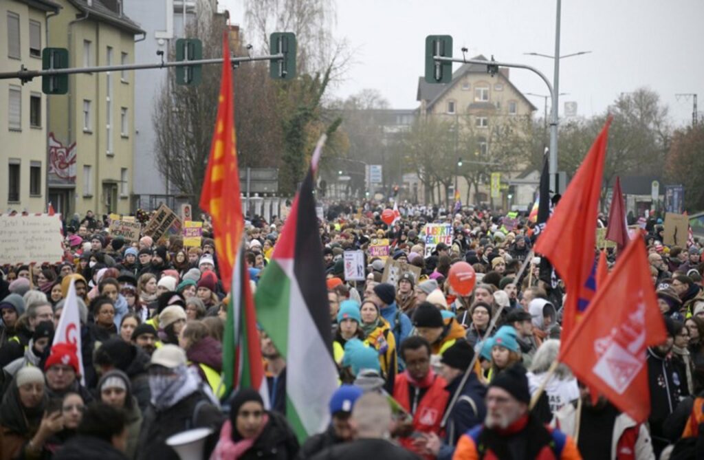 Demonstrations force Germany's far-right to postpone its congress