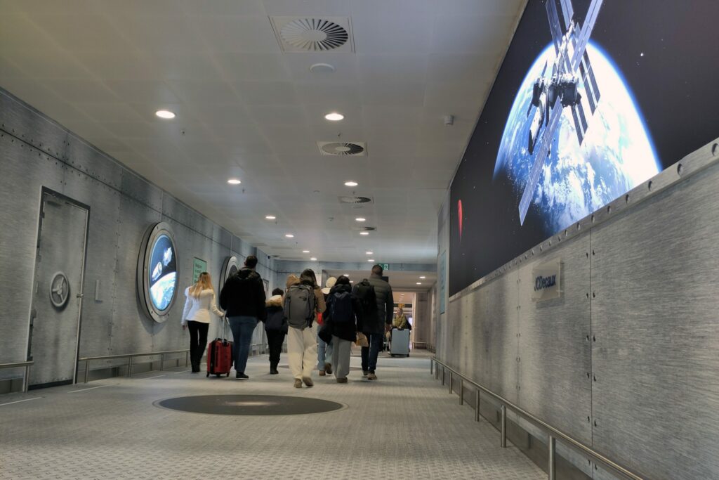 Brussels Airport corridor transformed into 'spaceship' to highlight space travel