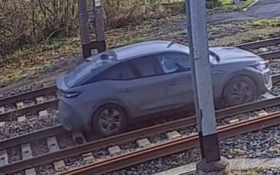 Shocking footage shows car on railway tracks as train approaches