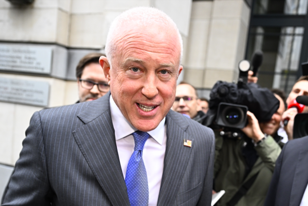 US ambassador rows back on Rousseau travel ban threat